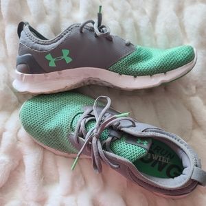 Green Under Armour women's shoe.